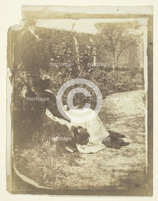 Mrs. Craik Reclining in Garden with Hat and Book, 1848/60. Creators: Unknown, Benjamin Mulock.