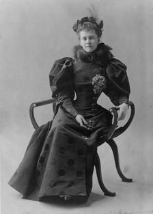 Mrs. Elizabeth Cameron, full-length portrait, seated, facing front, between c1890 and c1910. Creator: Frances Benjamin Johnston