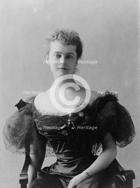Mrs. Elizabeth Cameron, half-length portrait, seated, facing front, between c1890 and c1910. Creator: Frances Benjamin Johnston.