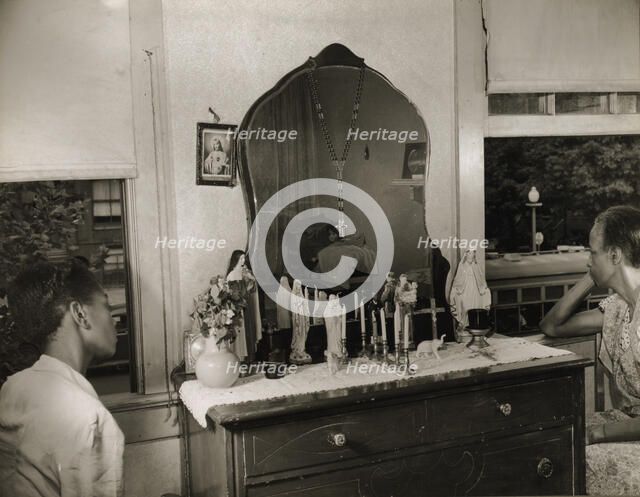 Mrs. Ella Watson, a government charwoman and her adopted daughter, Washington, D.C., 1942. Creator: Gordon Parks.