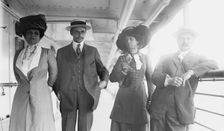 Mrs. G. Gould, Jay Gould, Marjorie Gould, and Geo. Gould, in boat deck, 1911. Creator: Bain News Service
