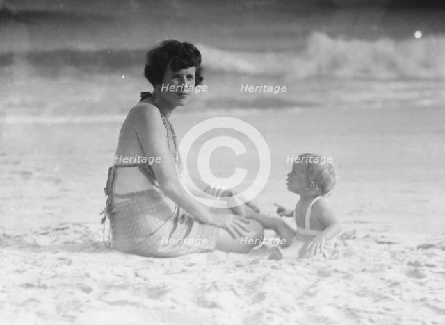 Mrs. George Eustis and child, at the beach, between 1911 and 1942. Creator: Arnold Genthe.