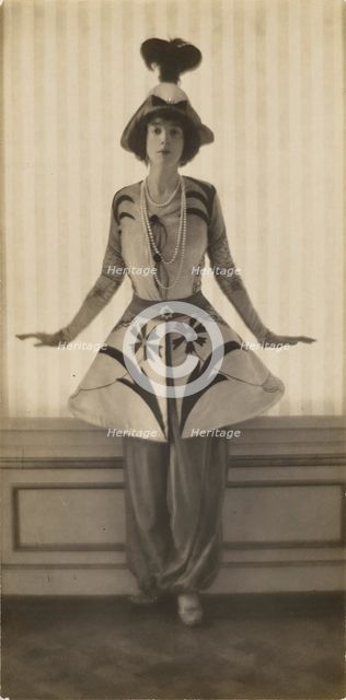 Mrs. Gertrude Vanderbilt Whitney, in a Costume by Leon Bakst, 1913. Creator: Baron Adolf Edward Sigismond de Meyer.