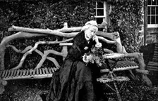 Mrs. Gladstone in the garden of Blackcraig Castle, Blairgowrie, September 1893, (1898). Creator: Valentine & Sons
