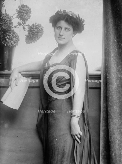Mrs. Inez Milholland posing with scroll of paper, 1910. Creator: Bain News Service.