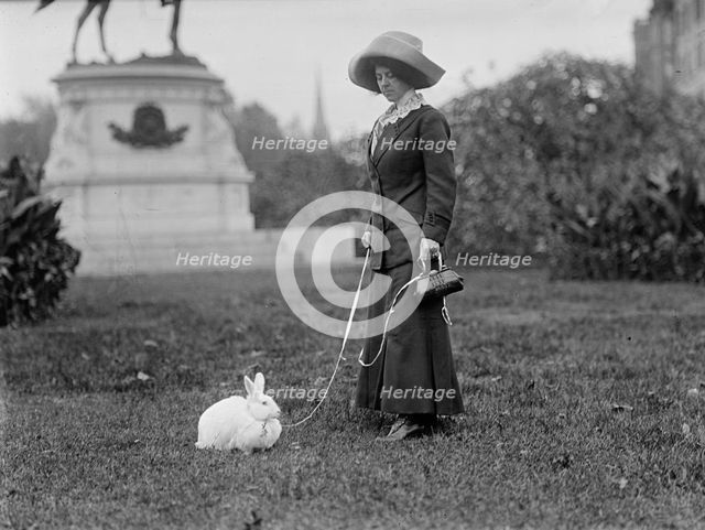 Mrs. J.R. Band with Pet Rabbit, 1911. Creator: Harris & Ewing.