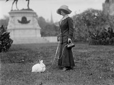 Mrs. J.R. Band with Pet Rabbit, 1911. Creator: Harris & Ewing