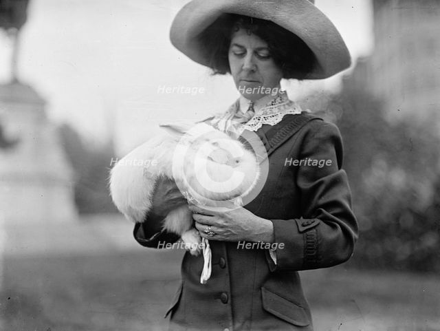 Mrs. J.R. Band with Pet Rabbit, 1911. Creator: Harris & Ewing.