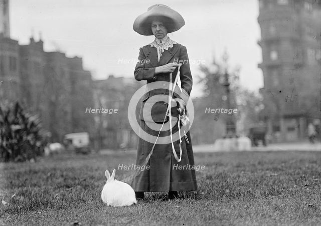 Mrs. J.R. Band with Pet Rabbit, 1911. Creator: Harris & Ewing.