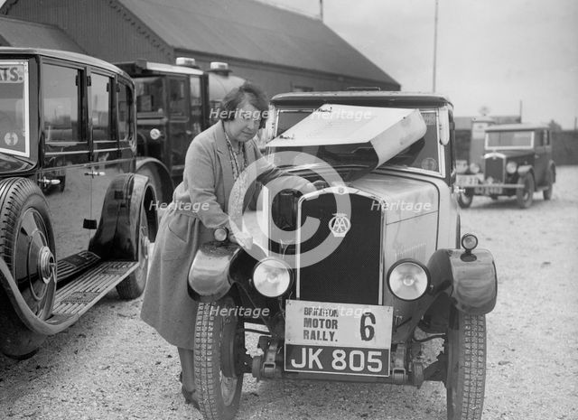 Mrs JW McClintock with her Triumph saloon at the B&HMC Brighton Motor Rally, 1930. Artist: Bill Brunell.