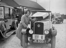 Mrs JW McClintock with her Triumph saloon at the B&HMC Brighton Motor Rally, 1930. Artist: Bill Brunell