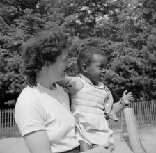 Mrs. Janet P. Murray with nursery school camper, Camp Ellen Marvin, Arden, New York, 1943. Creator: Gordon Parks