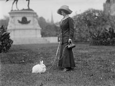 Mrs. J.R. Band with Pet Rabbit, 1911. Creator: Harris & Ewing