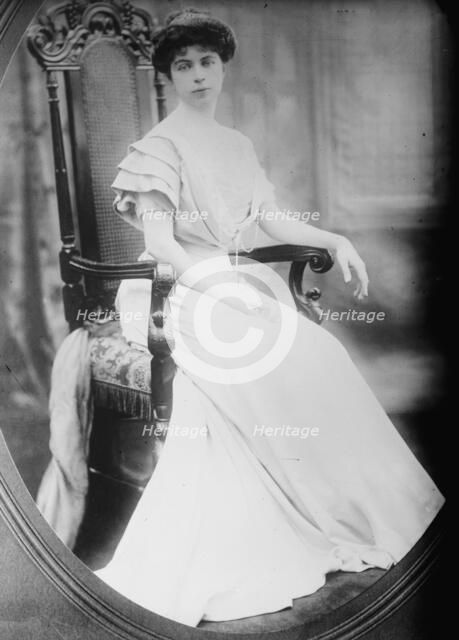 Mrs. L.V. Harcourt, cameo portrait, sitting, 1912. Creator: Bain News Service.