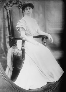 Mrs. L.V. Harcourt, cameo portrait, sitting, 1912. Creator: Bain News Service