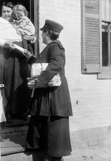 Mrs. Parmlee Campbell, Woman Mail Carrier - Delivering Mail..., 1917 Creator: Harris & Ewing
