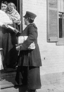 Mrs. Parmlee Campbell, Woman Mail Carrier - Delivering Mail..., 1917 Creator: Harris & Ewing