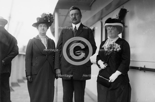 Mrs. R.A.C. Smith, Mr. R.A.C.Smith, and Mrs. J.F. Day, between c1910 and c1915. Creator: Bain News Service.