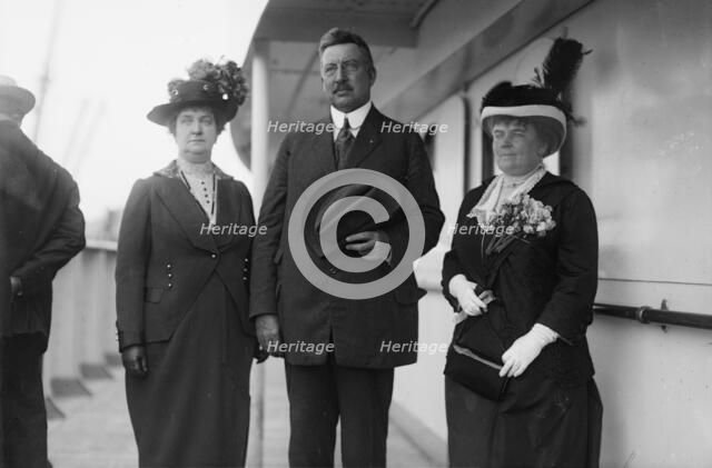 Mrs. R.A.C. Smith, Mr. R.A.C.Smith, and Mrs. J.F. Day, between c1910 and c1915. Creator: Bain News Service.