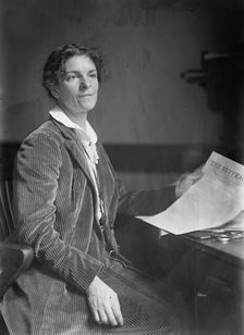 Mrs. Rheta C. Dorr, Suffragist, with First Edition of The Suffragist 1913. Creator: Harris & Ewing