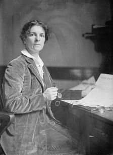 Mrs. Rheta C. Dorr, Suffragist, with First Edition of The Suffragist 1913. Creator: Harris & Ewing