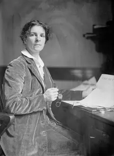 Mrs. Rheta C. Dorr, Suffragist, with First Edition of The Suffragist 1913. Creator: Harris & Ewing