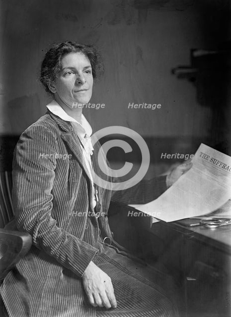 Mrs. Rheta C. Dorr, Suffragist, with First Edition of 'The Suffragist', 1913. Creator: Harris & Ewing.