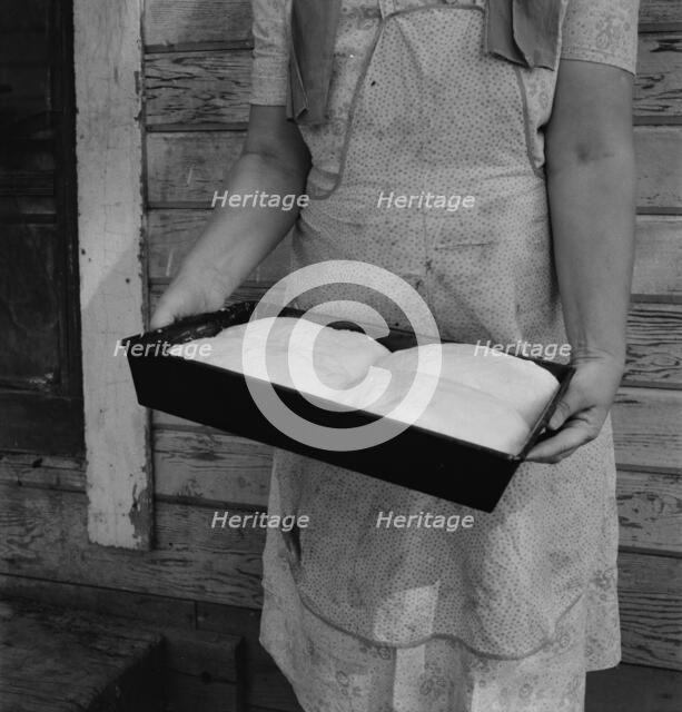 Mrs. Schrock takes good care of her family, Yakima Valley, Washington (near Wapato), 1939. Creator: Dorothea Lange.
