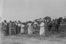 Mrs. T.B. Wells, Mrs. D.A. Palmer & Mary G. Hay -- suffrage farm, 1917. Creator: Bain News Service