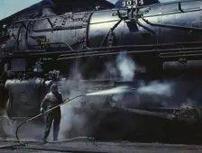Mrs. Viola Sievers, one of the wipers at the roundhouse giving a giant "H"..., Clinton, Iowa, 1943. Creator: Jack Delano