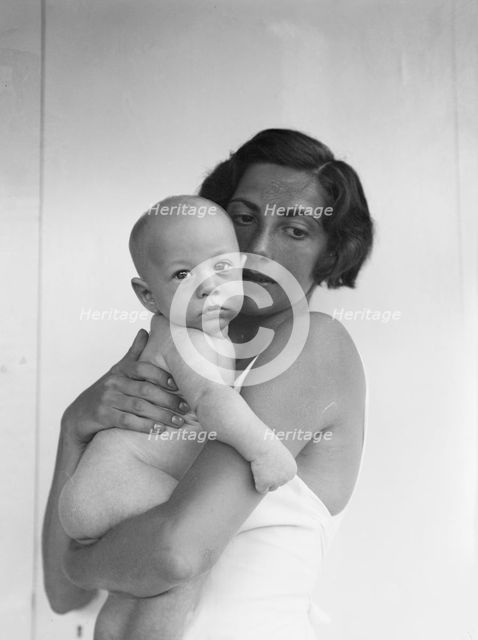 Mrs. William Muschenheim and baby, portrait photograph, between 1911 and 1942. Creator: Arnold Genthe.
