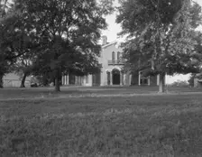 Mt. Holly Plantation house, built in 1840, still occupied, near Foote, Mississippi, 1937. Creator: Dorothea Lange
