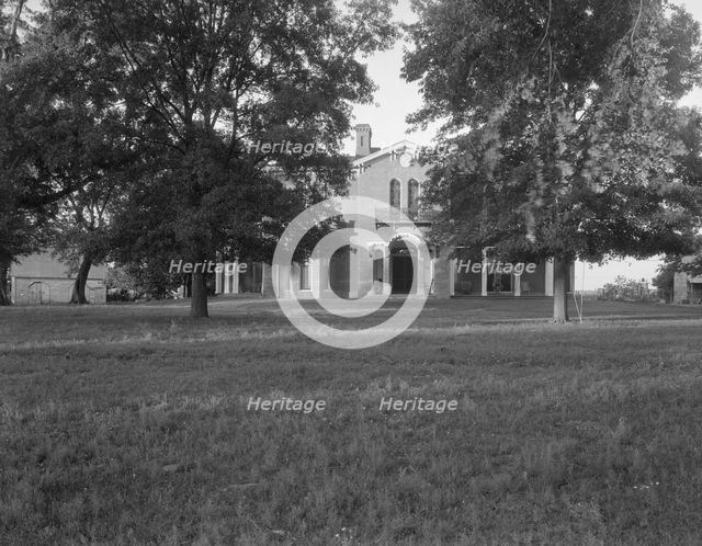 Mt. Holly Plantation house, built in 1840, still occupied, near Foote, Mississippi, 1937. Creator: Dorothea Lange.