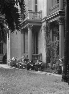 Multi-story house, possibly in the Garden District, New Orleans, between 1920 and 1926. Creator: Arnold Genthe