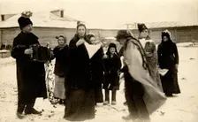 Mummers on the streets of the Znamensky Glass Factory on Christmastide, 1913-1914. Creator: S. Ia. Mamontov
