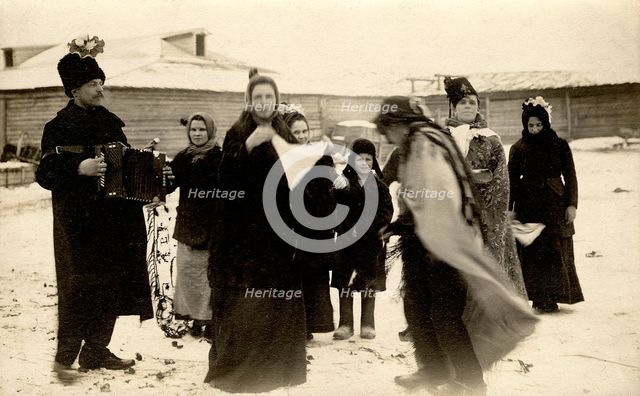 Mummers on the streets of the Znamensky Glass Factory on Christmastide, 1913-1914. Creator: S. Ia. Mamontov.