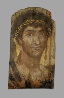 Mummy Portrait of a Man Wearing a Laurel Wreath, Fayum, Early to mid-2nd century. Creator: Unknown