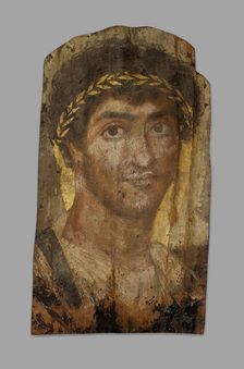 Mummy Portrait of a Man Wearing a Laurel Wreath, Fayum, Early to mid-2nd century. Creator: Unknown