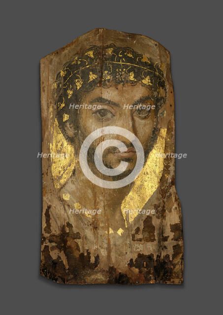 Mummy Portrait of a Man Wearing an Ivy Wreath, Fayum, Early to mid-2nd century. Creator: Unknown.