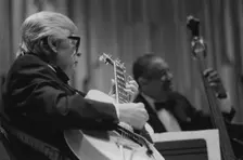 Mundell Lowe, Andre Previn Trio, Barbican, 1995. Creator: Brian Foskett