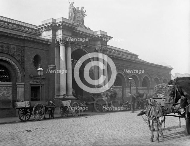 Municipal building and street scene - possibly Ireland, c1890s. Creator: Robert Augustus Henry L'Estrange.