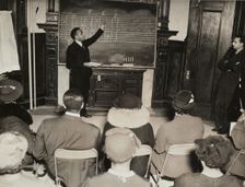 Music class with instructor at the board, 1935 - 1943. Creator: Unknown