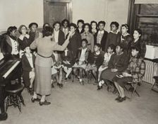 Music classes, singing, 1938. Creator: Aubrey Pollard