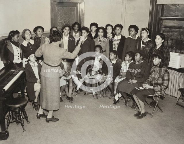 Music classes, singing, 1938. Creator: Aubrey Pollard.