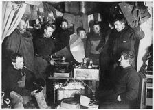 Music in the Hut Scott's South Pole expedition, 1911. Artist: Herbert Ponting