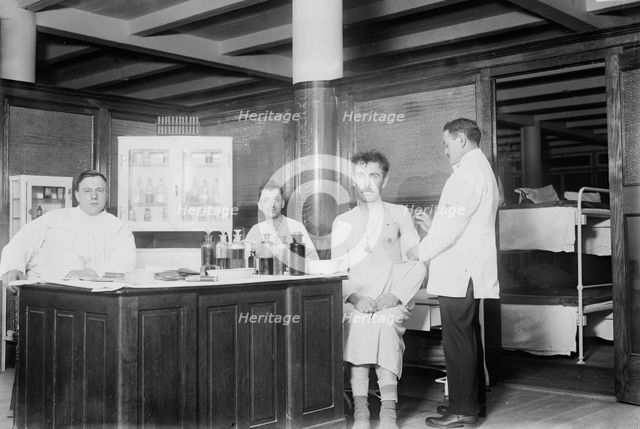 N.Y. City lodging house - vaccinating, 1914. Creator: Bain News Service.