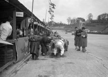 N Black and CW Fiennes MG C type in the pits at the JCC Double Twelve race, Brooklands, May 1931. Artist: Bill Brunell