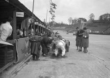 N Black and CW Fiennes MG C type in the pits at the JCC Double Twelve race, Brooklands, May 1931. Artist: Bill Brunell