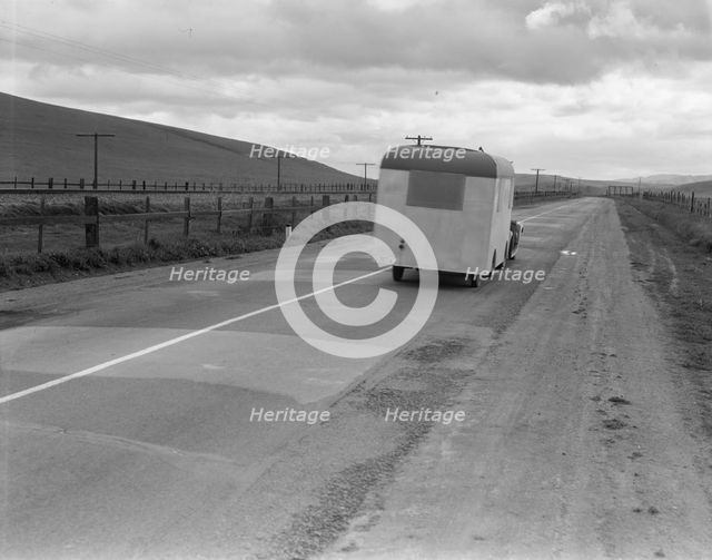 Note on "mobile housing" - Car and homemade trailer on U.S. 101 near King City, 1936. Creator: Dorothea Lange.