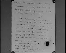 Notes of Ransom Being Shown as Articles of Evidence in the Lindbergh's Kidnapping Case Trial, 1930s. Creator: British Pathe Ltd
